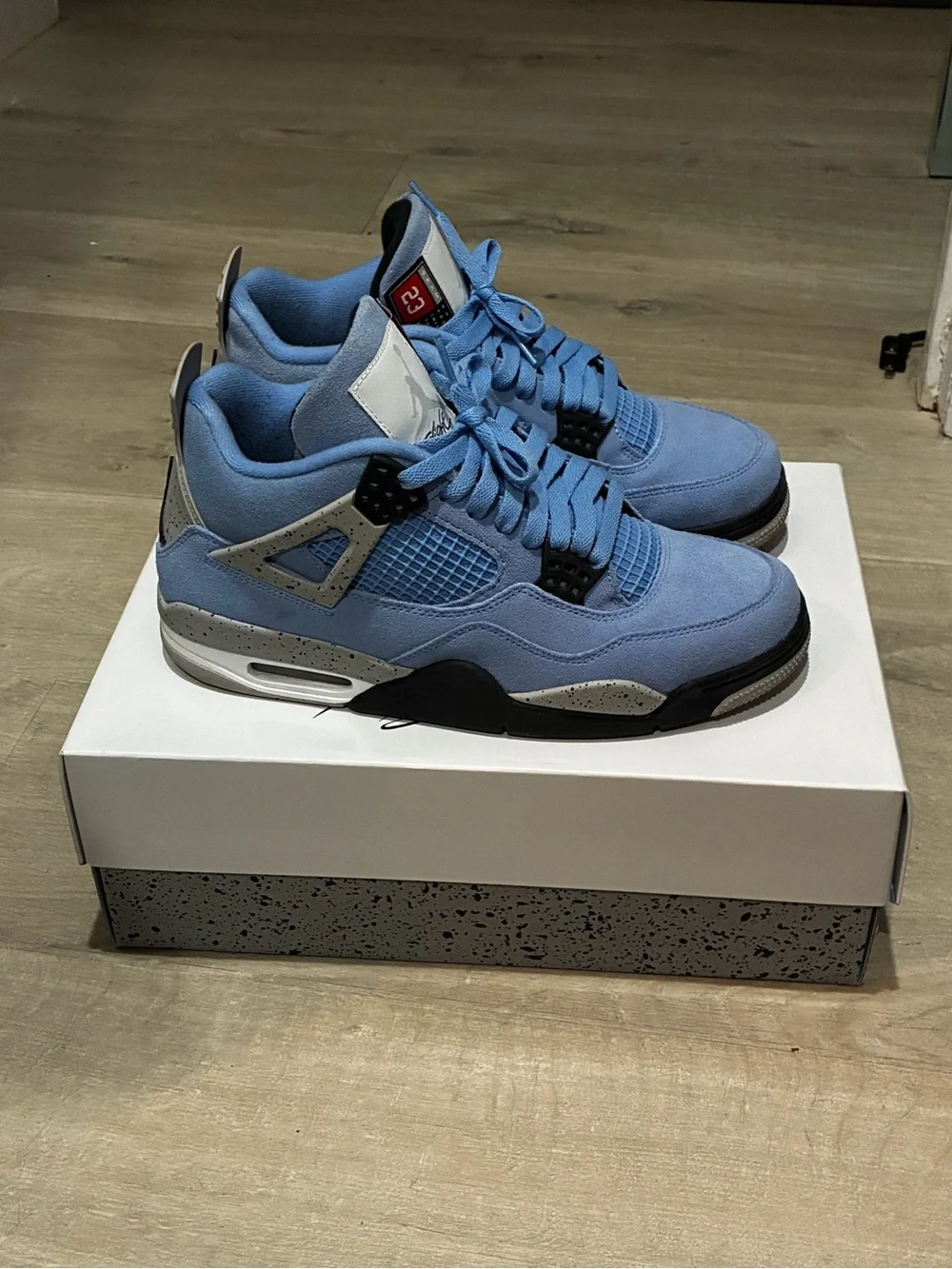 Air Jordan 4 UNC Men’s Athletic Shoes - Light Blue and Black